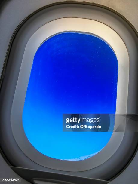 pov of an airplane window - window frame stock pictures, royalty-free photos & images