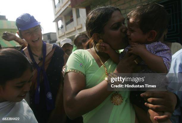 One and a half year old mohammed Fazal cries as Sonia Mausi kisses him while campaigning in her constituency of Shahpur. The eunuch who is also known...