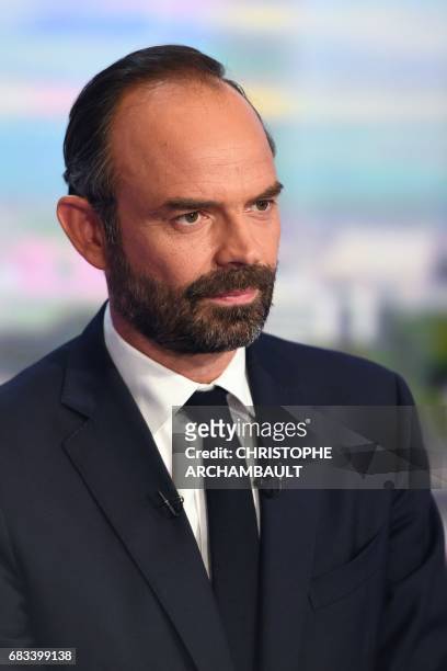 France's newly appointed Prime Minister Edouard Philippe poses prior to taking part in the evening news broadcast of French TV channel TF1, on May 15...