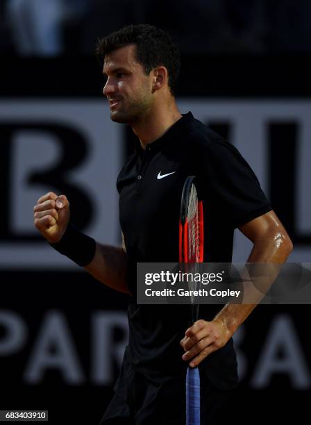 Grigor Dimitrov of Bulgaria celebrates winning a point during his first round match against Juan Martin Del Potro of Argentina in The Internazionali...