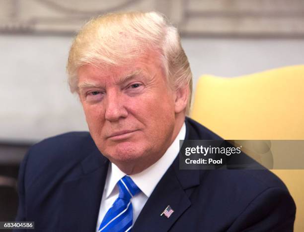 President Donald Trump welcomes Crown Prince Shaikh Mohammad bin Zayed Al Nahyan of Abu Dhabi in the Oval Office of the White House on May 15, 2017...