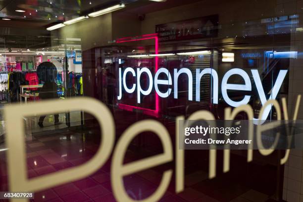 View of the entrance of a JC Penney department store in the Manhattan Mall, May 15, 2017 in the Herald Square neighborhood in New York City. Shares...