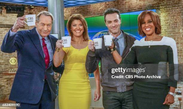 Actor Reid Scott, second from right, who plays a CTM anchor on the show "VEEP", shares a toast with true anchors Charlie Rose, Norah O'Donnel and...