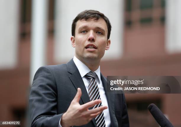 Washington state Solicitor General Noah Purcell speaks to media outside US Court of Appeals in Seattle, Washington on May 15, 2017. A US government...