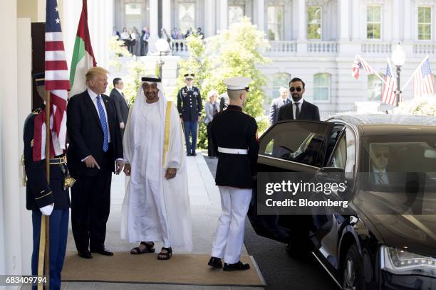 President Donald Trump, left, greets Mohammed Bin Zayed Al Nahyan, crown prince of Abu Dhabi, center, at the West Wing of the White House in...