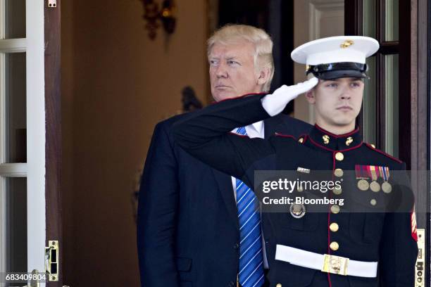 President Donald Trump, exits the West Wing of the White House to greet Mohammed Bin Zayed Al Nahyan, crown prince of Abu Dhabi, not pictured, in...