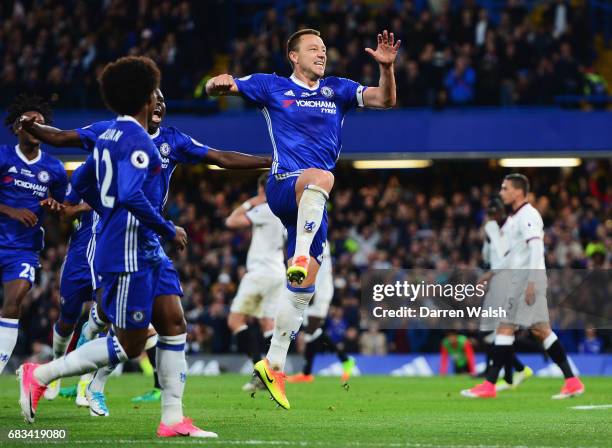 John Terry of Chelsea celebrates scoring his sides first goal during the Premier League match between Chelsea and Watford at Stamford Bridge on May...