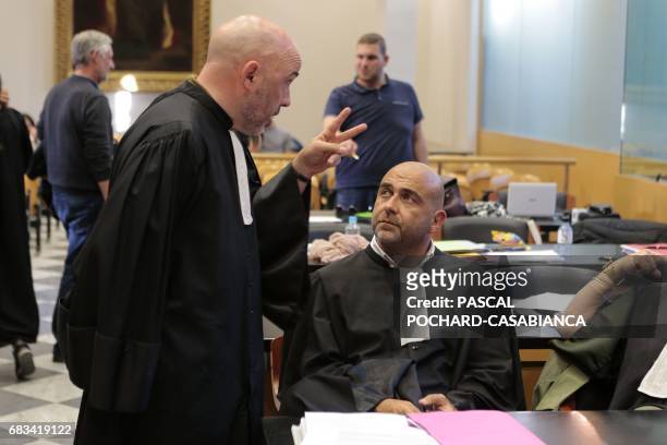 Lawyers of Bastia's supporters Jean-Andre Albertini and Jacques Vaccarezza speak during the opening of the trial of 15 people after clashes broke out...