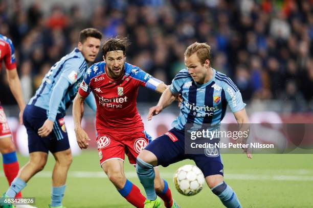 Mattias Bjarsmyr of IFK Goteborg and Gustav Engvall of Djurgardens IF competes for the ball during the Allsvenskan match between Djurgardens IF and...