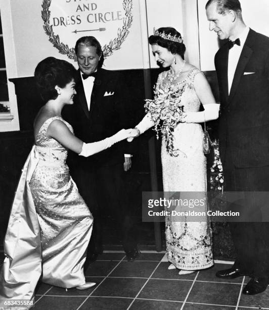 Entertainer Connie Francis meets Queen Elizabeth and Prince Phillip on January 27, 1964 in New York.