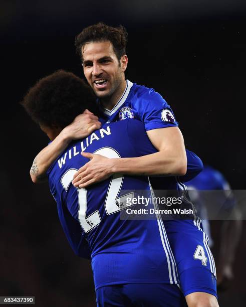 Cesc Fabregas of Chelsea celebrates scoring his sides fourth goal with Willian of Chelsea during the Premier League match between Chelsea and Watford...