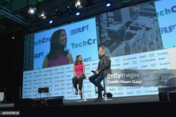 And Founder of Tala Shivani Siroya and TechCrunch editor-at-large Mike Butcher speak onstage during TechCrunch Disrupt NY 2017 at Pier 36 on May 15,...