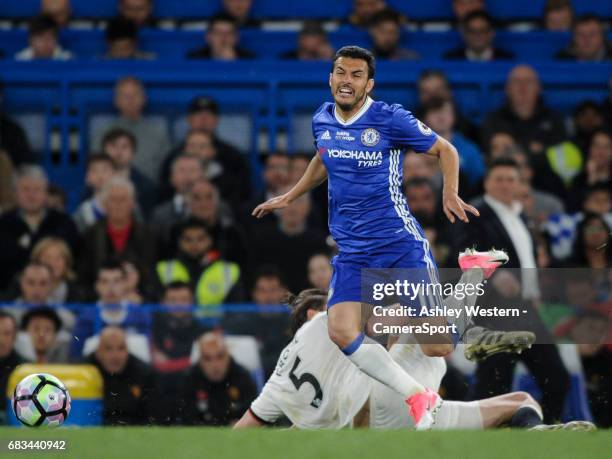 Chelsea's Pedro is fouled by Watford's Sebastian Prodl leading to his red card during the Premier League match between Chelsea and Watford at...