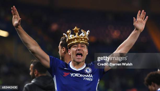 John Terry of Chelsea celebrates with a inflatable after the Premier League match between Chelsea and Watford at Stamford Bridge on May 15, 2017 in...