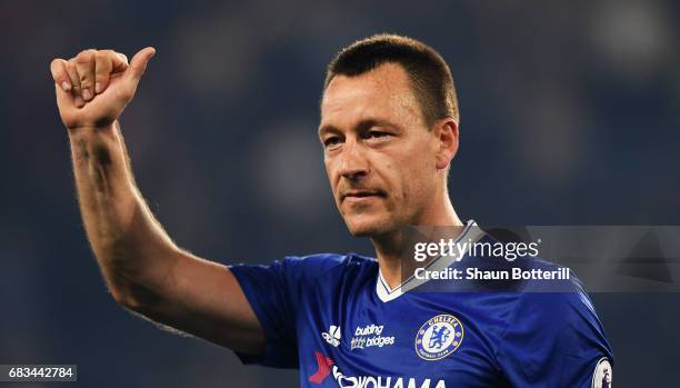 John Terry of Chelsea shows appreciation to the fans after the Premier League match between Chelsea and Watford at Stamford Bridge on May 15, 2017 in...