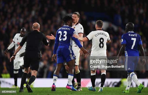Michy Batshuayi of Chelsea and Sebastian Prodl of Watford clash during the Premier League match between Chelsea and Watford at Stamford Bridge on May...