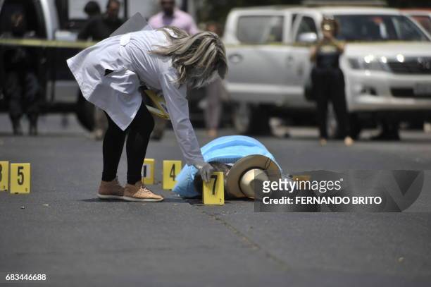 The body of Mexican journalist Javier Valdez lies on the street after he was shot dead in Culiacan, Sinaloa, Mexico, on May 15, 2017. Valdez who...