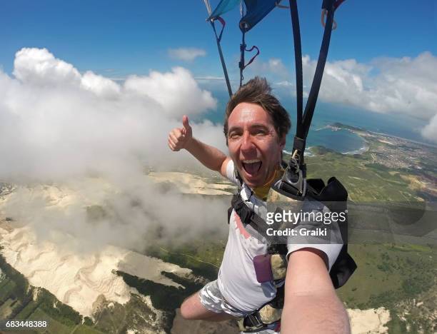 skydiver selfie - extreme sports man stock pictures, royalty-free photos & images