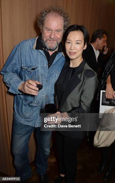 Mike Figgis and Rosey Chan attend '8 Years Of My Life', an intimate evening of music with Rosey Chan hosted by Rosey Chan and Client Earth, at Cafe...