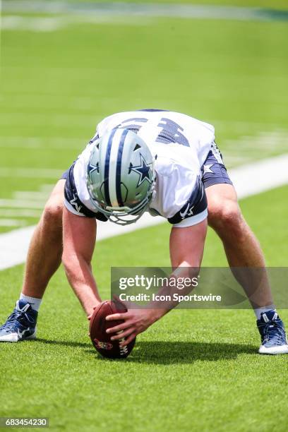 Dallas Cowboys deep snapper Zach Wood works during the Dallas Cowboys Rookie Camp on snapping the ball for punt drills during the Dallas Cowboys...