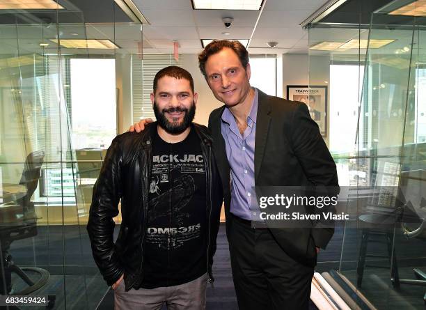 Actors Guillermo Diaz and Tony Goldwyn visit SiriusXM Studios on May 15, 2017 in New York City.