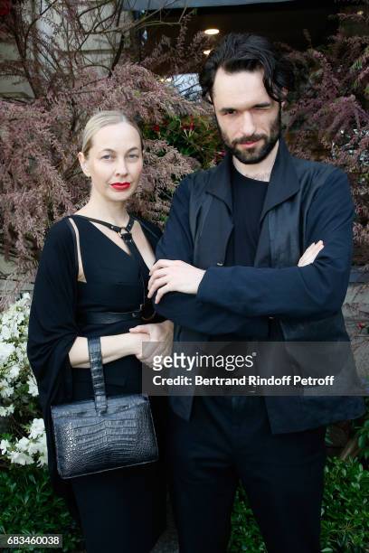 Melonie Foster Hennessy and Re Watter attend the "The Garden of Peter Marino" Book Signing at "Moulie Flowers" on May 15, 2017 in Paris, France....