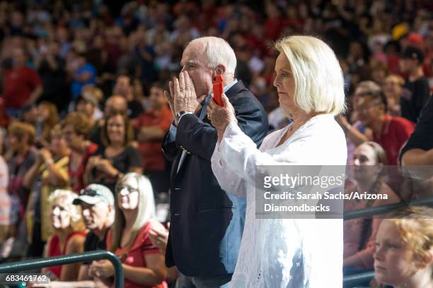 Senator John McCain and wife Cindy attend the MLB game between the Arizona Diamondbacks and the Pittsburgh Pirates at Chase Field on May 14, 2017 in...