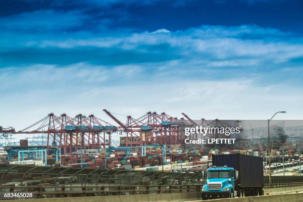 heavy cargo on the road - long beach california stock pictures, royalty-free photos & images