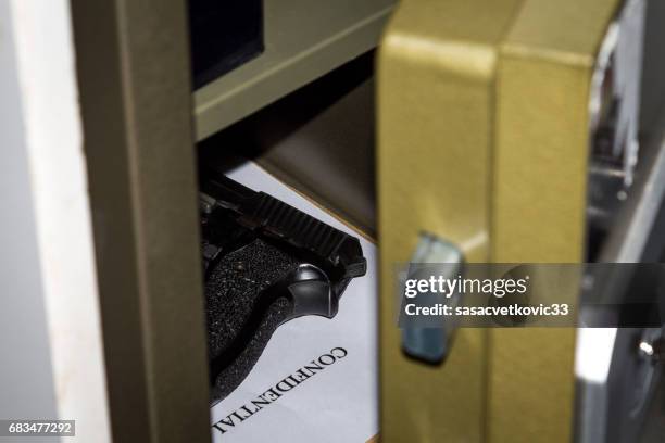 open metal bank safe - gun storage stock pictures, royalty-free photos & images