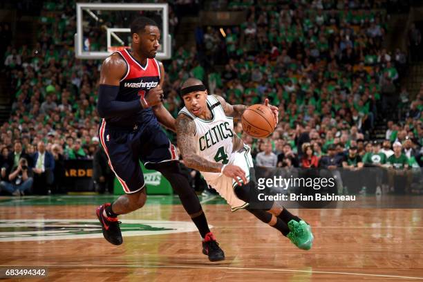 Isaiah Thomas of the Boston Celtics drives to the basket against the Washington Wizards during Game Seven of the Eastern Conference Semifinals of the...