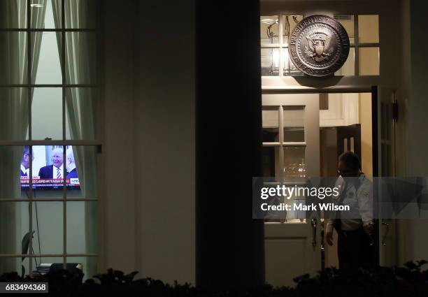 President Donald Trump is seen on a television news show in the West Wing of the White House, on May 15, 2017 in Washington, DC. Earlier, National...