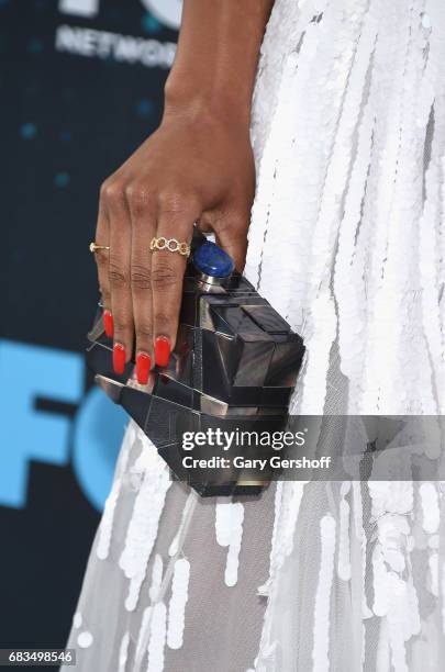 Actress Michelle Mitchenor, clutch & ring detail, of the show 'Lethal Weapon' attends the FOX Upfront on May 15, 2017 in New York City.