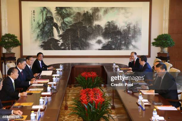 Toshihiro Nikai , Secretary General of the Japanese Liberal Democratic Party and Chinese President Xi Jinping attend a bilateral meeting at Diaoyutai...