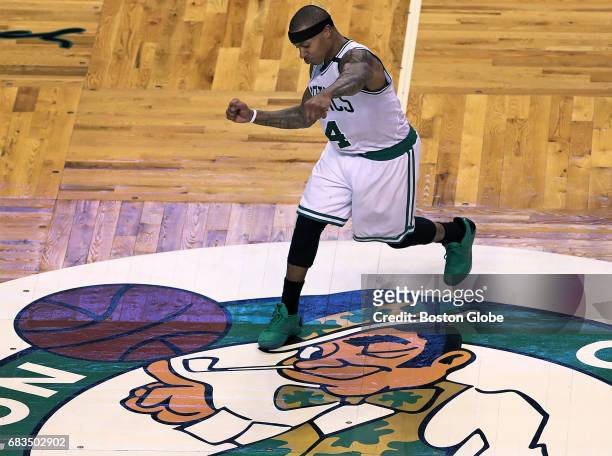 Boston Celtics player Isaiah Thomas reacts after hitting a three-point basket in the fourth quarter that put Boston ahead 94-81. The Boston Celtics...
