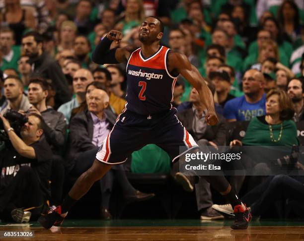 John Wall of the Washington Wizards reacts against the Boston Celtics during Game Seven of the NBA Eastern Conference Semi-Finals at TD Garden on May...