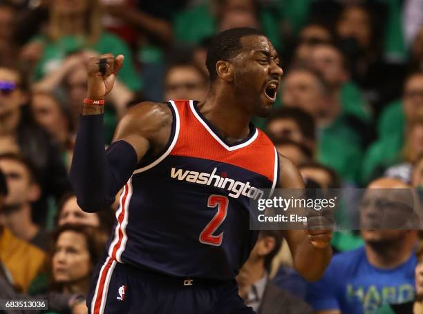 John Wall of the Washington Wizards reacts against the Boston Celtics during Game Seven of the NBA Eastern Conference Semi-Finals at TD Garden on May...