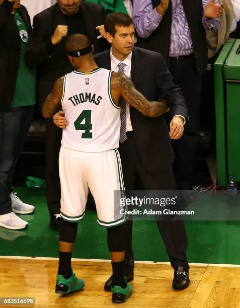 Isaiah Thomas of the Boston Celtics hugs Brad Stevens against the Washington Wizards during Game Seven of the NBA Eastern Conference Semi-Finals at...