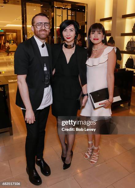 Jeremy Garcia, Carrie Brandsberg Dahl and Sandra Manela at the 'Party Girls Die in Pearls' book launch at Burberry Houston at The Galleria on May 15,...