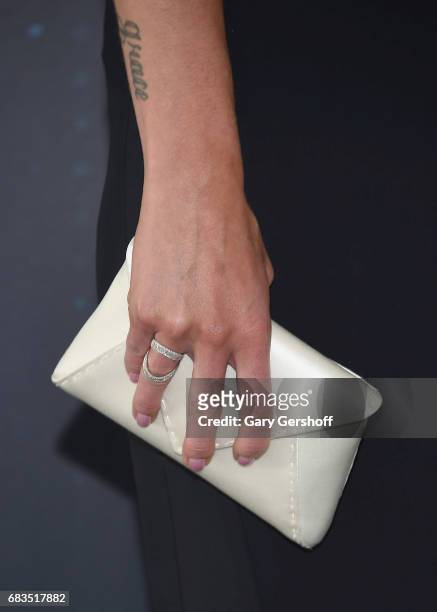 Actress Adrianne Palicki, clutch and tattoo detail, of the show 'Lucifer' attends the FOX Upfront on May 15, 2017 in New York City.