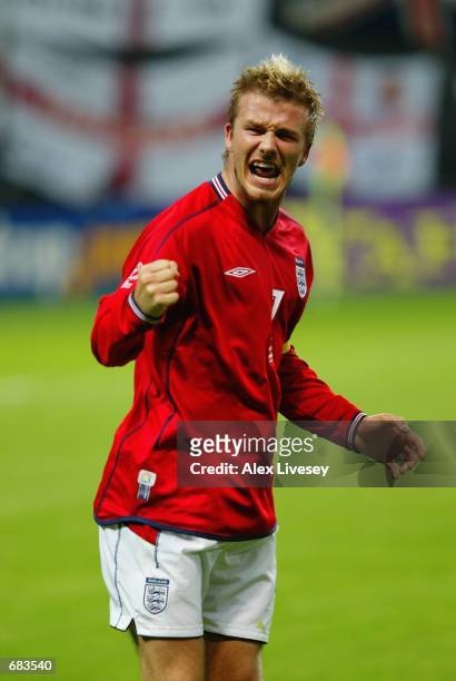 David Beckham of England celebrates scoring the first goal during the England v Argentina, Group F, World Cup Group Stage match played at the Sapporo...