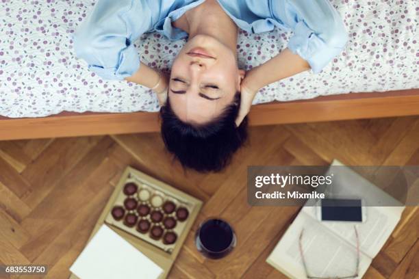 trying to overcome the depression with wine and chocolate - poetry stock pictures, royalty-free photos & images