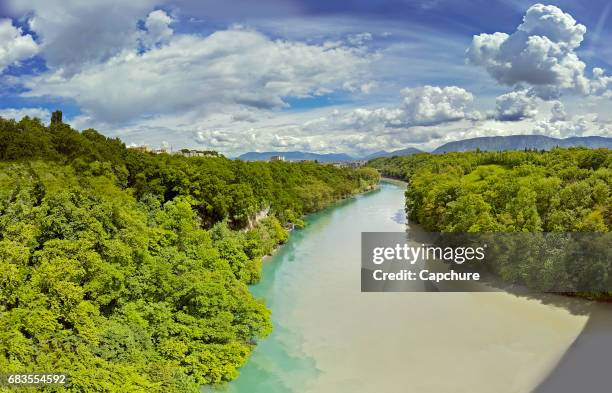 river rhone flowing from geneva - rhone stock pictures, royalty-free photos & images