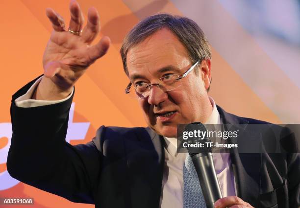 Armin Laschet, lead candidate of the German Christian Democrats , speaks to supporters after initial results in state elections in North...