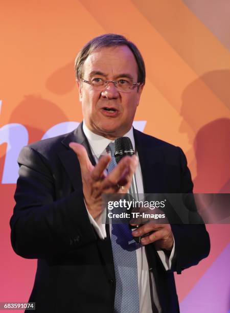 Armin Laschet, lead candidate of the German Christian Democrats , speaks to supporters after initial results in state elections in North...
