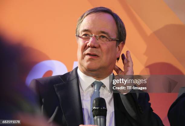 Armin Laschet, lead candidate of the German Christian Democrats , speaks to supporters after initial results in state elections in North...