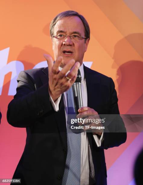 Armin Laschet, lead candidate of the German Christian Democrats , speaks to supporters after initial results in state elections in North...