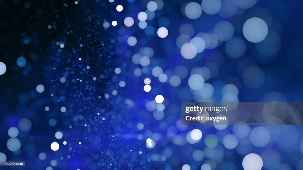 Abstract blue bokeh sparkling spray circle