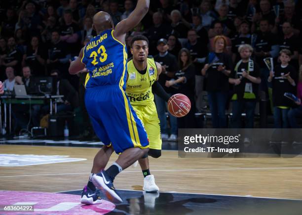 Lewis Trey of medi bayreuth and Paulding Rickey of Oldenburg battle for the ball during the easyCredit BBL match between medi bayreuth and EWE...