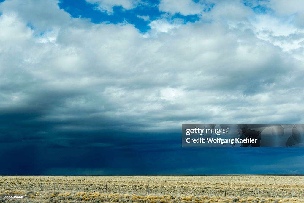 A storm with dark clouds over the pampa in Patagonia near El...