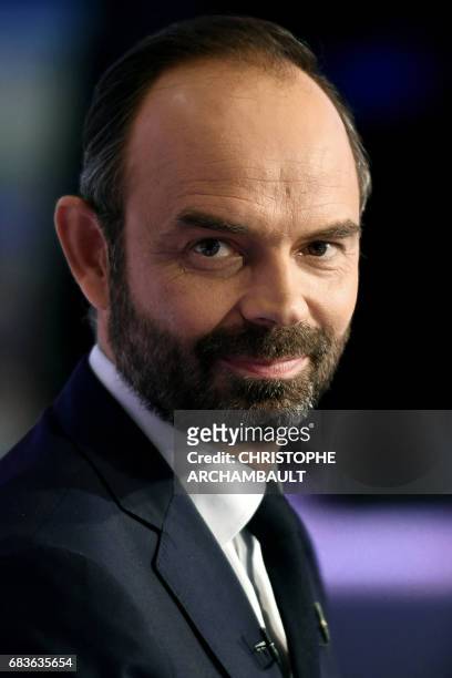 France's newly appointed Prime Minister Edouard Philippe poses prior to take part in the evening news broadcast of French TV channel TF1, on May 15...